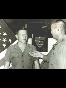 LCPL Olsen receives the Navy Commendation Medal